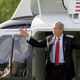 President Bush exits Marine One at the start of his four-hour visit to Washington's White House.